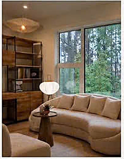 Built-in cabinetry that turned the dead corner into a quiet reading nook with hidden storage.